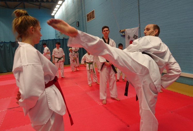 Master Hobbs demonstration of a kick - put knee up