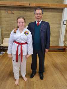 Judy with Grandmaster Yoon